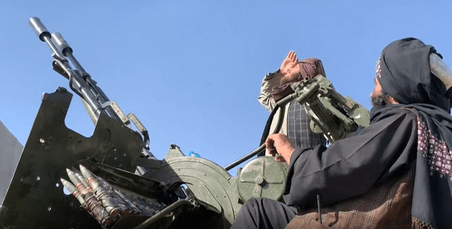 Screengrab from a video showing Afghan Taliban fighters patrolling the Pakistan-Afghanistan border in Spin Boldak following fresh clashes between the two countries on October 15, 2025. (AFP)