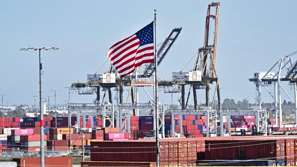 (FILES) Shipping containers are stacked at the Port of Long Beach on March 4, 2025 in Long Beach, California. (Photo by Frederic J. BROWN / AFP)