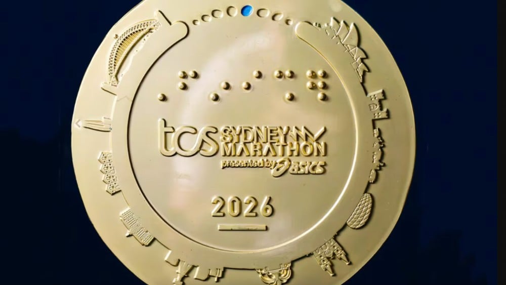 The medal design appears to show Munich's Allianz Arena on the bottom-right (Photo: Instagram/@sydney_marathon)