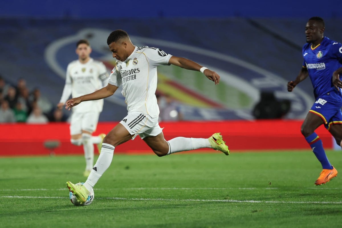 Mbappe sends Real Madrid top as Getafe self-destruct