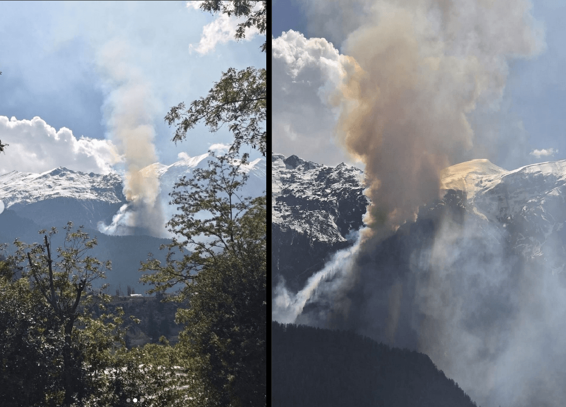 Smoke billows into the air after locals reported hearing a blast in a forested area of Kishtwar district in Indian Illegally Occupied Jammu and Kashmir on Friday. (Image credit: Jammu Diaries/Instagram)