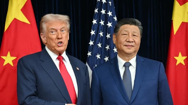BUSAN: US President Donald Trump (L) and China's President Xi Jinping greet each other as they arrive for talks at the Gimhae Air Base, located next to the Gimhae International Airport in Busan on October 30, 2025. -- Photo by AFP/File