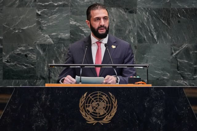 Syria interim President Ahmad Al-Sharaa addresses the 80th session of the United Nations General Assembly, Wednesday, Sept. 24, 2025. (AP Photo/Richard Drew)