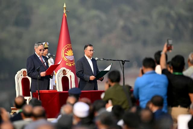 Bangladesh Nationalist Party (BNP) chairman Tarique Rahman (R) takes oath as prime minister during a swearing-in ceremony at the National Parliament building in Dhaka on February 17, 2026. (AFP)