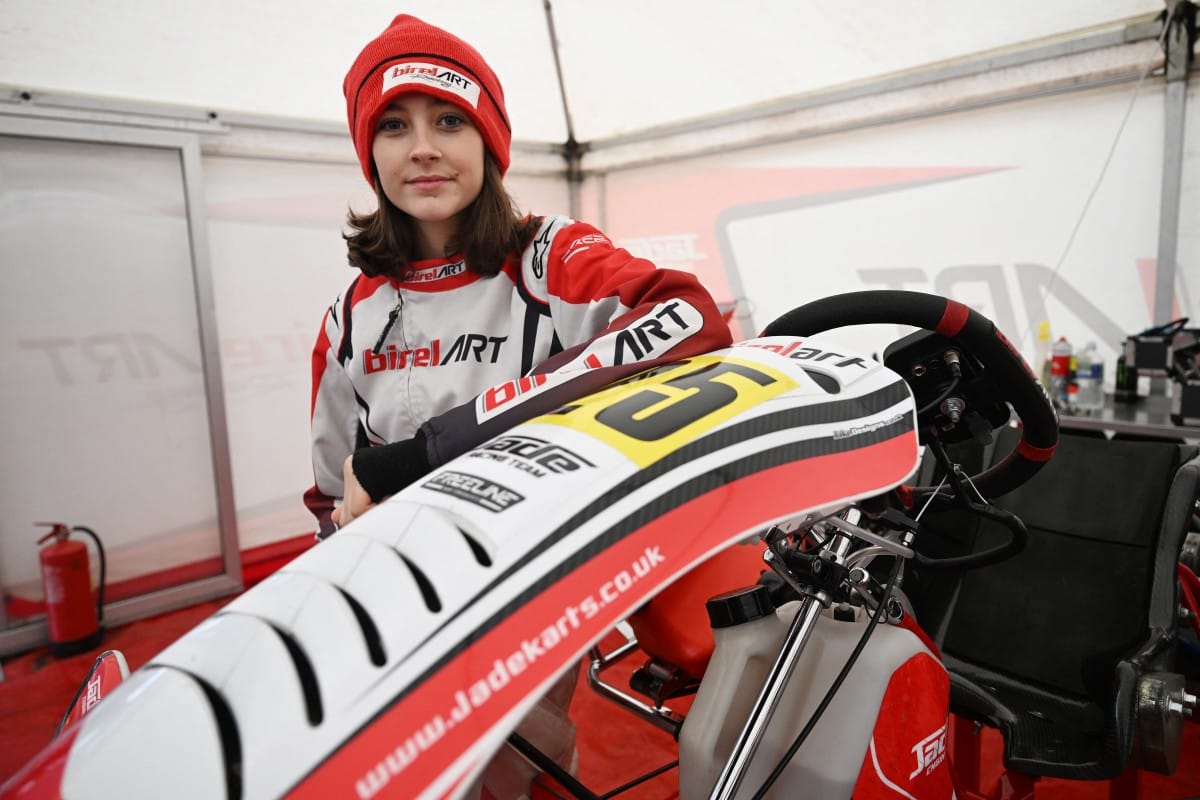 This photo taken on November 15, 2025 shows 15-year-old Skye Parker posing during a day out at the Shenington Kart Racing Club track in Shenington, central England. A dozen girls whizzed around an English karting track, part of a pioneering drive to draw