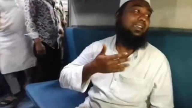 Screengrab shows a Muslim passenger who was allegedly beaten by a group of around 20 men on a passenger train in India because of his religious identity. (Photo: X/TheMuslim)