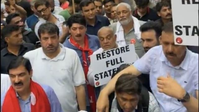 National Conference stages protest demanding statehood for Indian Occupied Jammu and Kashmir
