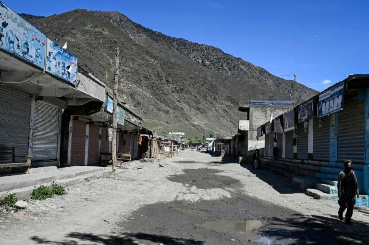 This photograph taken on April 13, 2026 shows closed shops in the Barikot village of Naray district, Kunar province. (AFP)