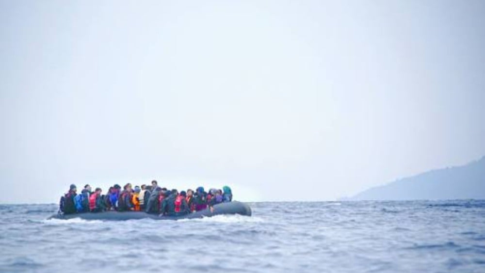 Migrants on a boat (Wikimedia Commons)