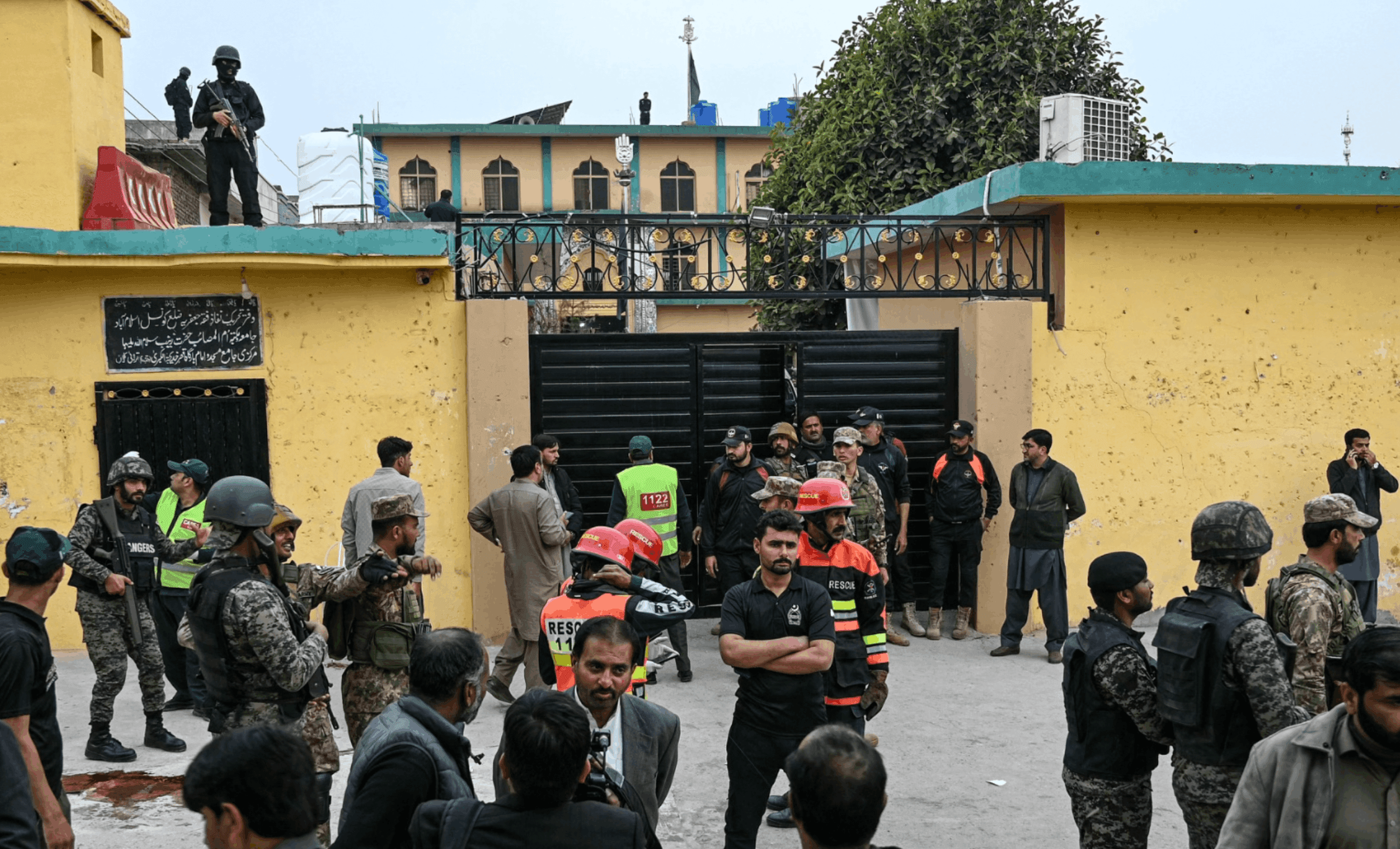 Security personnel stand guard outside a mosque following an explosion in Islamabad on February 6, 2026. (AFP)