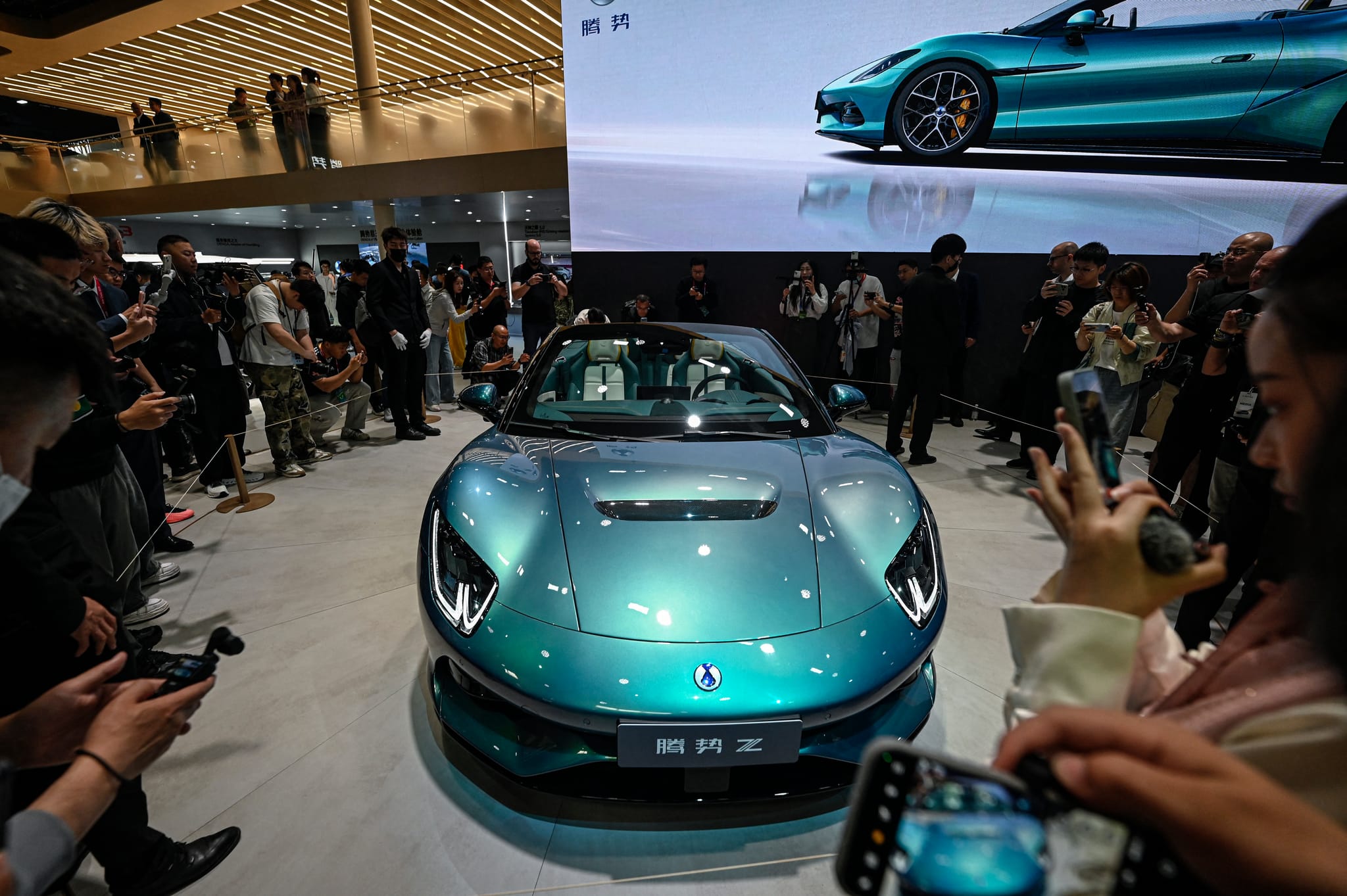 BYD-owned premium brand Denza Z model car is displayed at the Beijing Auto Show in Beijing on April 24, 2026. (AFP)