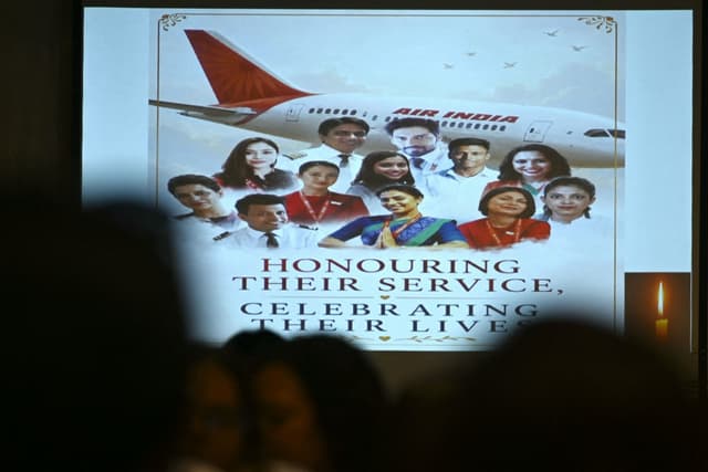 Family members of the crew of the Air India Flight 171 plane crash pay tribute during a memorial service on its first anniversary, in Mumbai on June 12, 2026 (AFP)