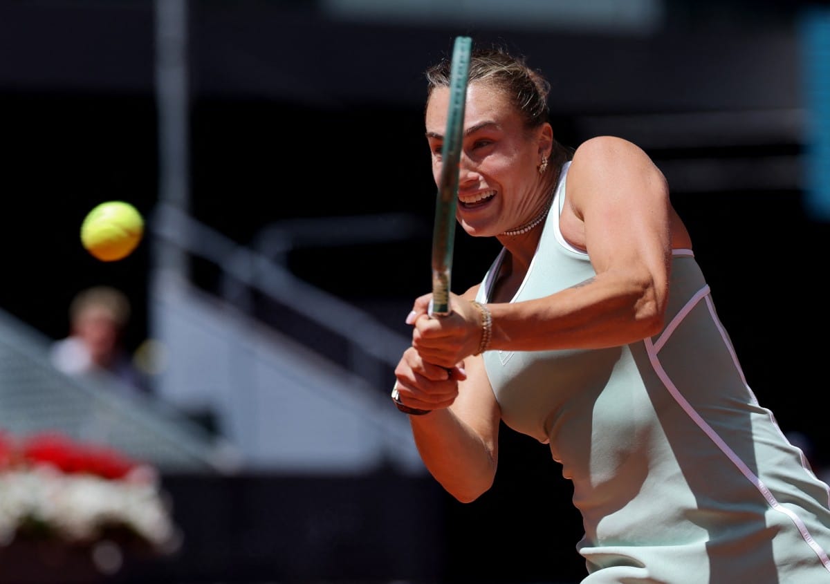 Belarus’ Aryna Sabalenka returns the ball to Japan’s Naomi Osaka during their 2026 WTA Tour Madrid Open tennis tournament women's singles match at the Caja Magica in Madrid, on April 27, 2026. (AFP)