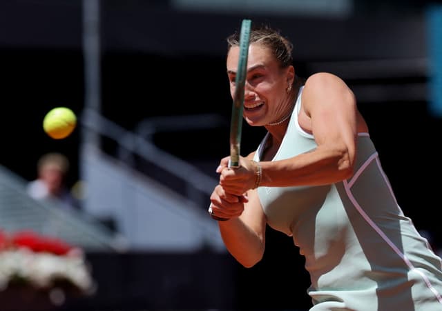 Belarus’ Aryna Sabalenka returns the ball to Japan’s Naomi Osaka during their 2026 WTA Tour Madrid Open tennis tournament women's singles match at the Caja Magica in Madrid, on April 27, 2026. (AFP)