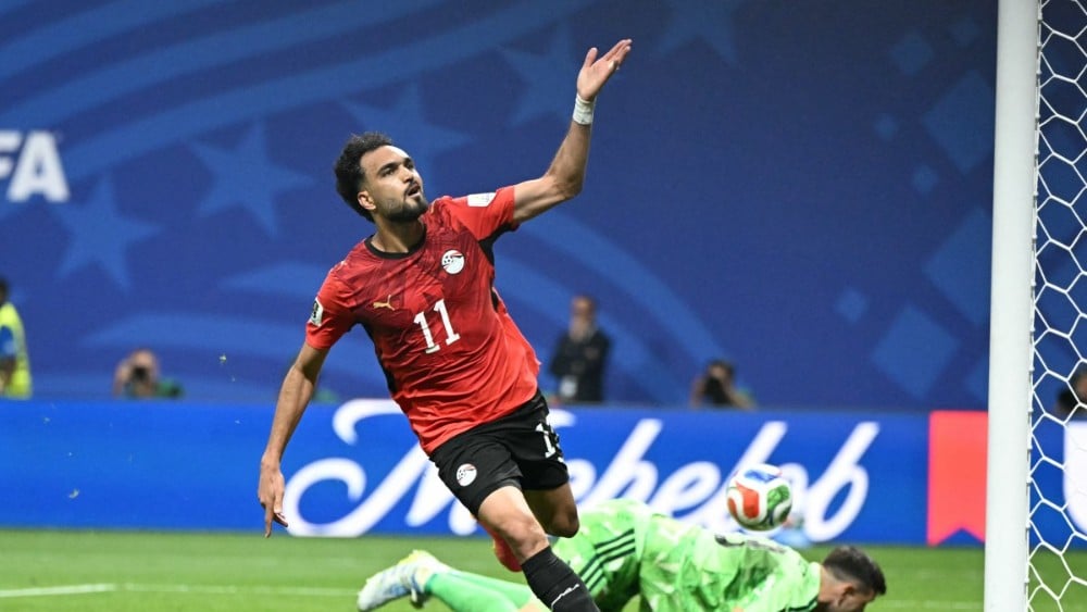 TOPSHOT - Egypt's midfielder #11 Mostafa Ziko celebrates scoring his team's second goal during the 2026 World Cup round of 16 football match between Argentina and Egypt at Atlanta Stadium in Atlanta on July 7, 2026. (Photo by ROBERTO SCHMIDT / AFP)