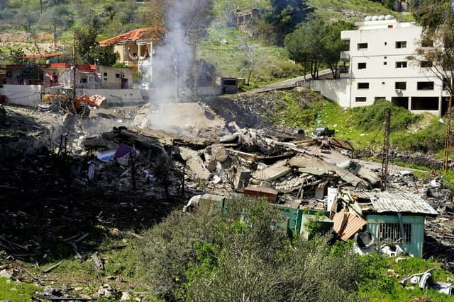 The rubble of a destroyed building is pictured after overnight Israeli bombardment on a civil defence station in Lebanon's southern city of Nabatieh on Marsch 18, 2026.