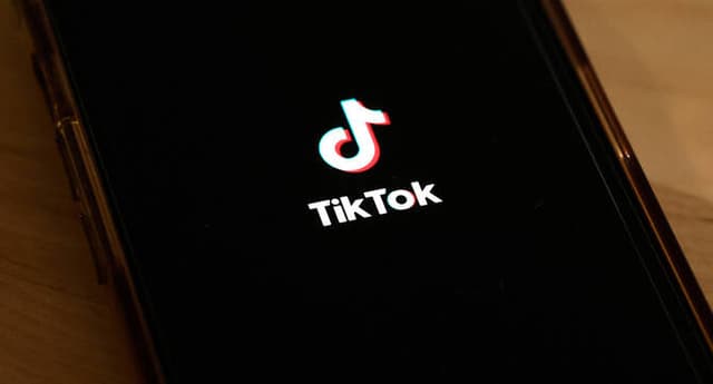 In this photo illustration, the TikTok app is seen on a phone on March 13, 2024 in New York City. (AFP/ file)