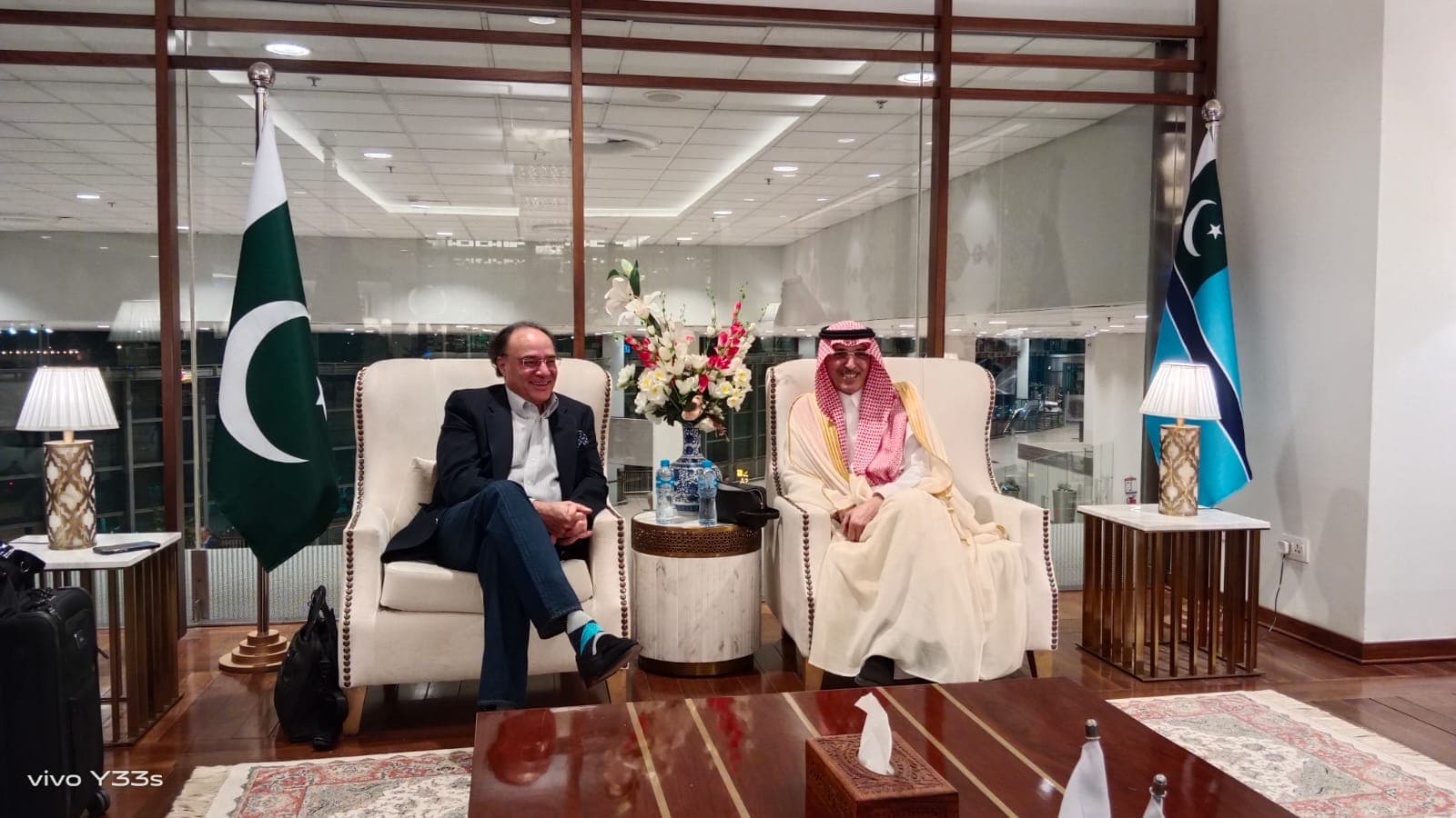 Pakistan Minister for Finance and Revenue Muhammad Aurangzeb, left, talks with Saudi Arabia Finance Minister Mohammed bin Abdullah al-Jadaan during a high-level meeting in Islamabad, Pakistan, Friday, April 10, 2026. (Ministry of Finance/X)