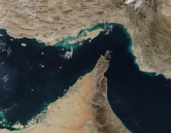 The narrow Strait of Hormuz lies between the Persian Gulf and the Gulf of Oman, separating Iran (north) from the Arabian Peninsula (south). (NASA)