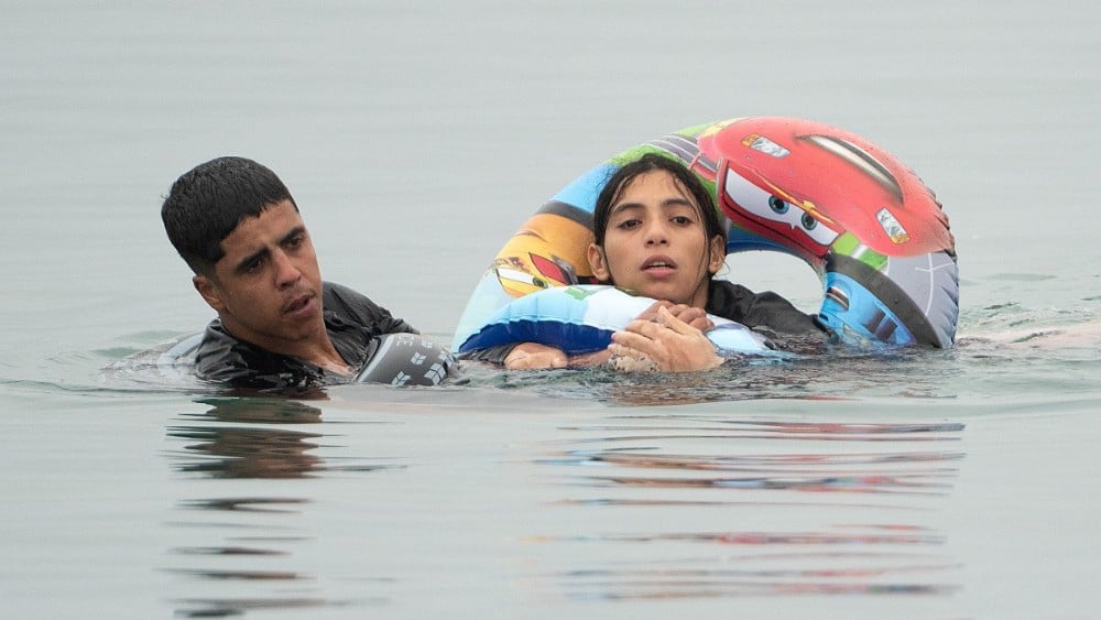 Thousands cross into Spain's north Africa enclave in new migrant crisis