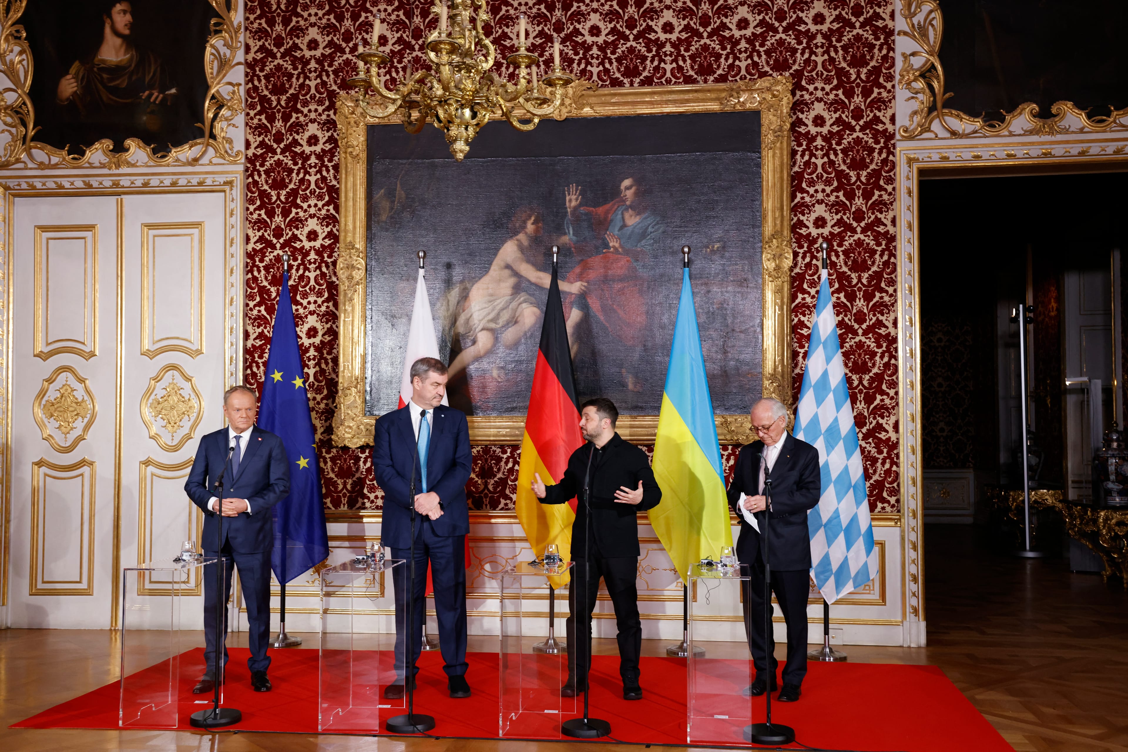 Polish PM Donald Tusk, Bavarian State Premier Markus Soeder, Ukrainian President Volodymyr Zelensky and Munich Security Conference chairman Wolfgang Ischinger give a press statement at the Munich Residence palace, prior to the traditional dinner on the oc