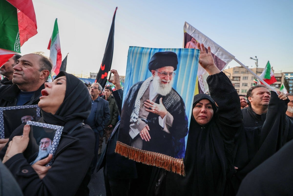 People mourn the death of Iran’s supreme leader Ayatollah Ali Khamenei in Tehran (AFP/File)