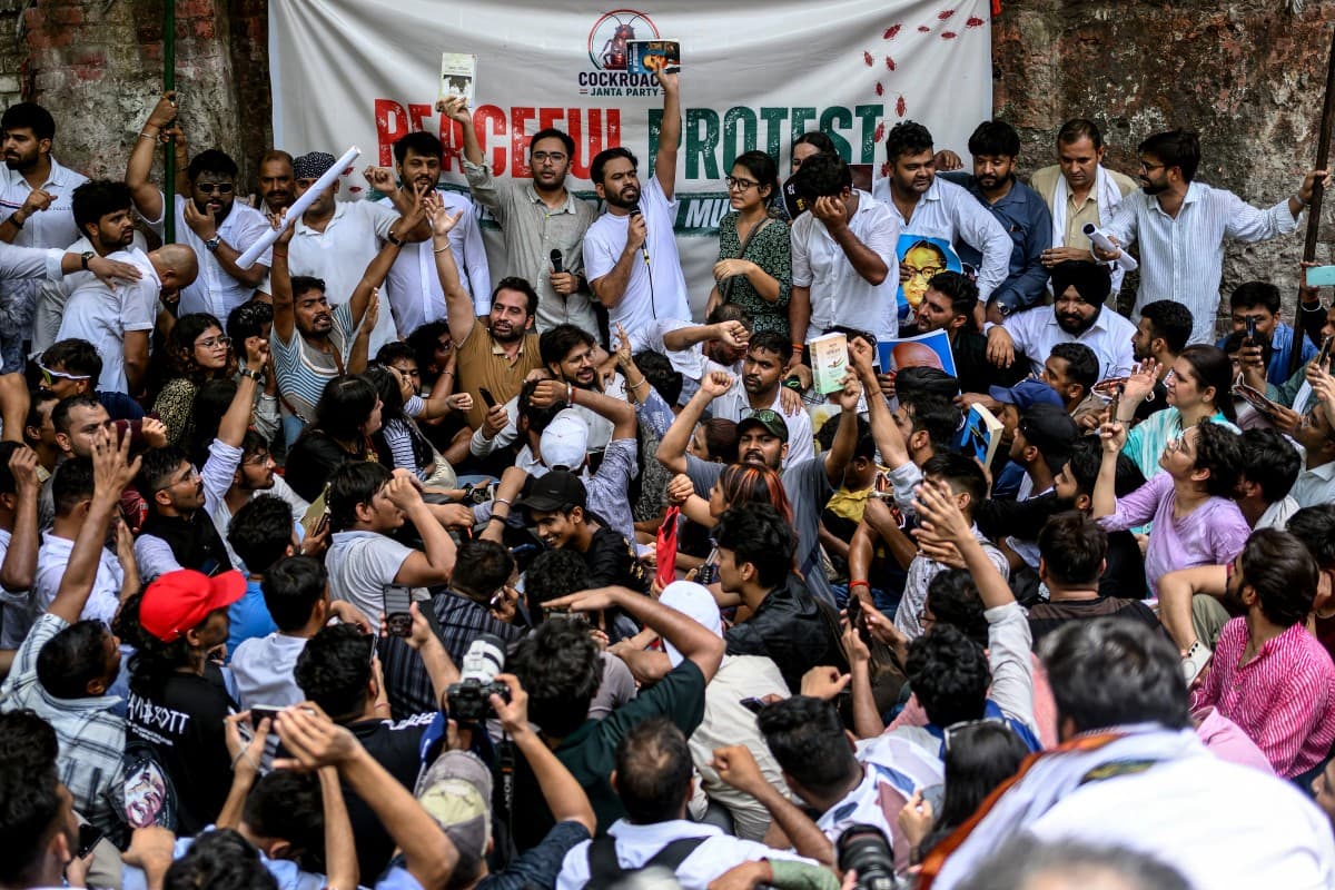 Cockroach Janta Party (CJP) founder Abhijeet Dipke (C) shouts slogans during a protest over alleged irregularities in the country's major examinations, in New Delhi on June 6, 2026. (Photo: AFP/File)