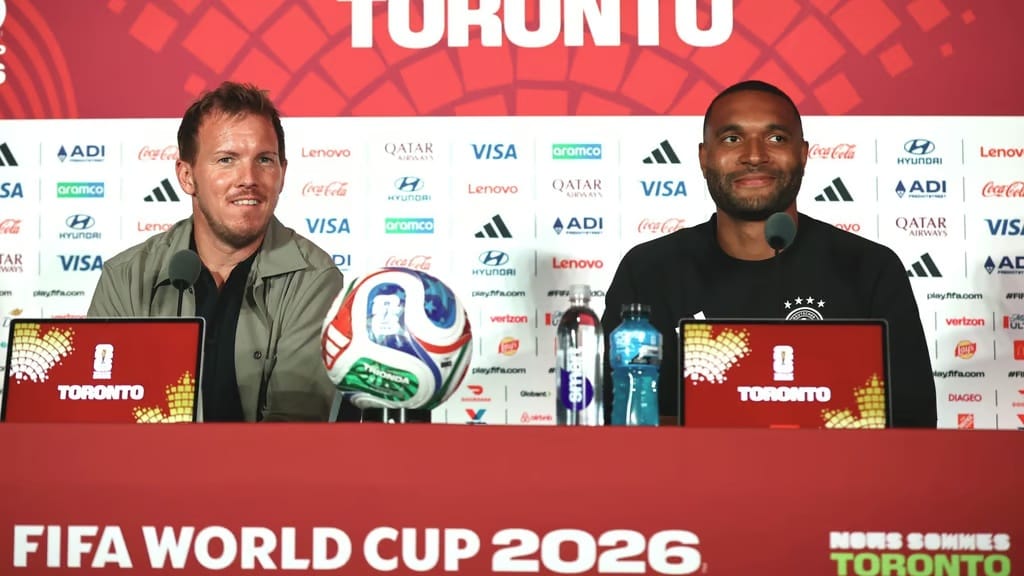 German National Team Coach Julian Nagelsmann (left) and Jonathan Tah attend the final press conference ahead of the second World Cup group stage match against Ivory Coast. (AFP)