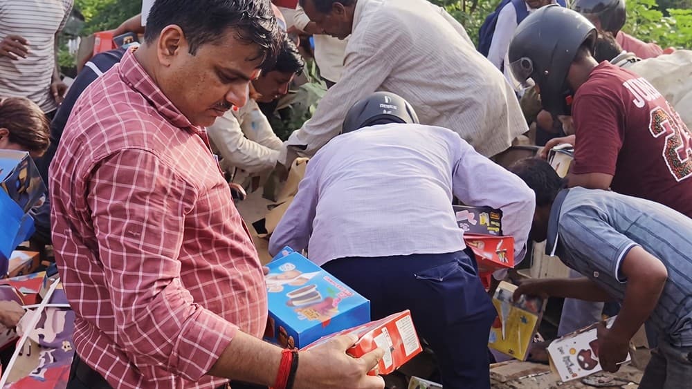 People scramble for expired chocolates dumped in India’s Kanpur
