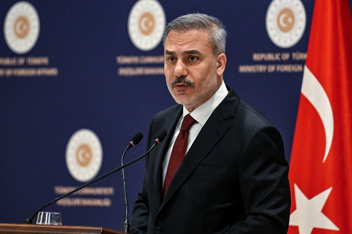 Turkish Minister of Foreign Affairs Hakan Fidan addresses the audience during a press briefing in Istanbul, on January 15, 2026. (Photo by OZAN KOSE / AFP)