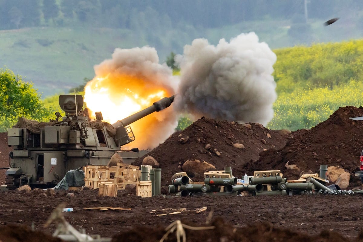 An Israeli self-propelled howitzer artillery gun fires rounds towards southern Lebanon from a position in the upper Galilee in northern Israel near the border on March 15, 2026 (AFP)