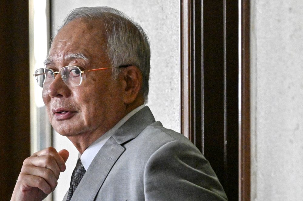 Former Malaysian PM found guilty on all 21 counts of money laundering