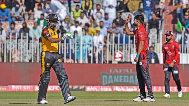 Haris Rauf celebrates after taking Babar Azam's wicket in a PSL 10 encounter.