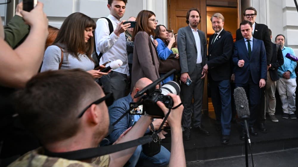 Russia's liberal Yabloko party leader Nikolay Rybakov talks to the media outside the Supreme Court in Moscow on August 10, 2026. (Photo: AFP)