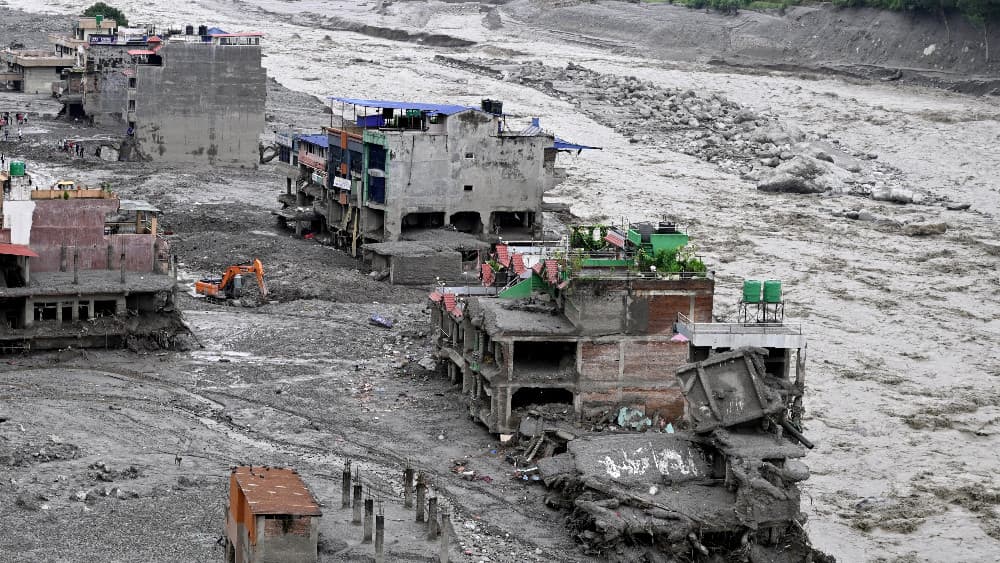 Damaged houses lie deluged in sludge after flash floods at Trishuli Center in Nepal's Nuwakot district on August 31, 2026. (AFP)