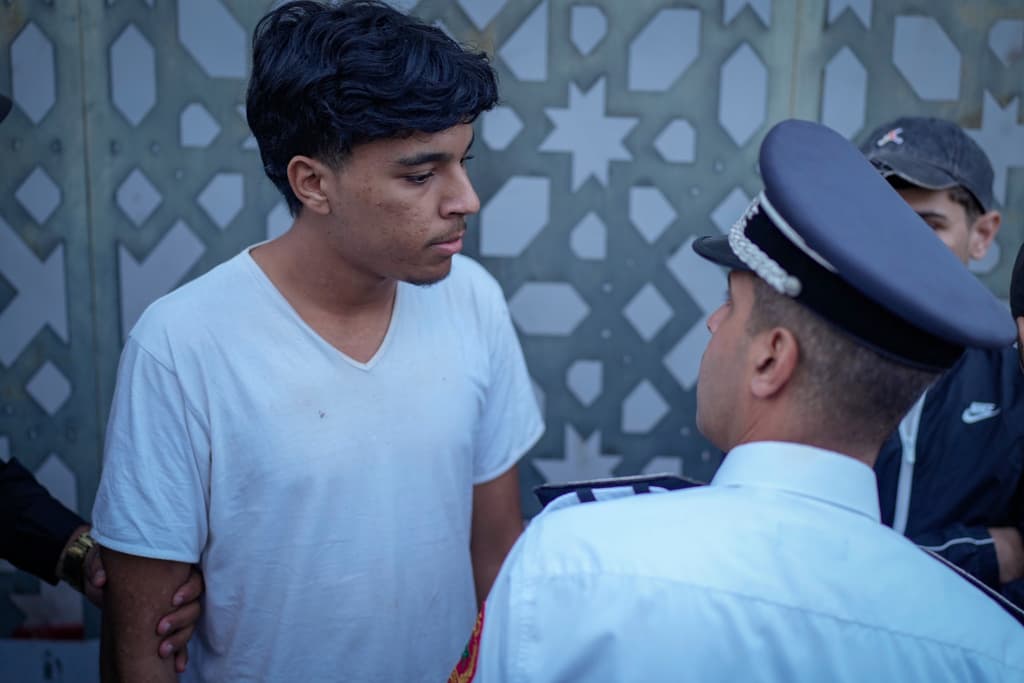 A boy is detained while taking part in a youth led protest calling for education and health reforms, in Casablanca, Morocco, Monday, Sept. 29, 2025. (AP)